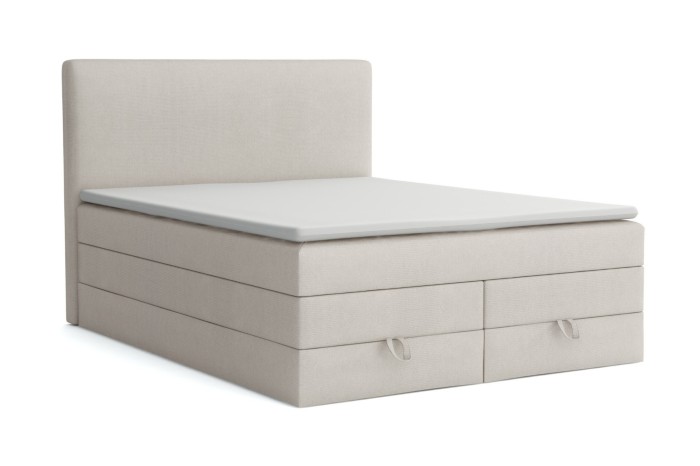 Beiges Boxspringbett mit praktischem Bettkasten und gepolstertem Kopfteil auf weißem Hintergrund.