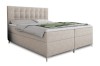 Modernes Boxspringbett Erik in Beige mit gestepptem Kopfteil und grauer Bettwäsche.