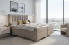 Gemütliches Schlafzimmer-Design mit dem Boxspringbett Erik und hellen Akzenten.
