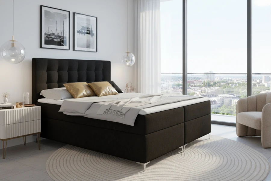 Anthrazitfarbenes Boxspringbett in modernem Schlafzimmer mit Aussicht und hellem Interieur.