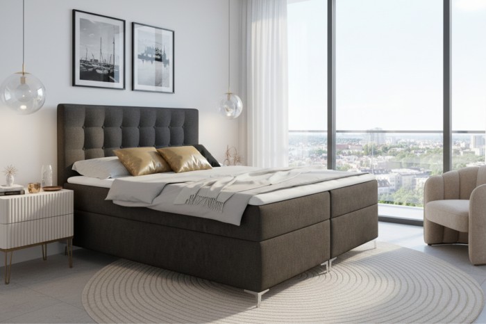 Schlafzimmer-Inspiration: Das Boxspringbett Erik in einem hellen, modernen Ambiente.