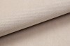 Nahaufnahme der beigen Textilstruktur des Boxspringbett-Bezugs.