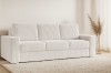 Gemütliches Cord-Sofa Timon im Wohnzimmer mit Teppich und Dekoration.