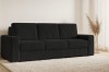 Schwarzes Cord-Sofa in stilvollem Wohnzimmer mit hellem Teppich.