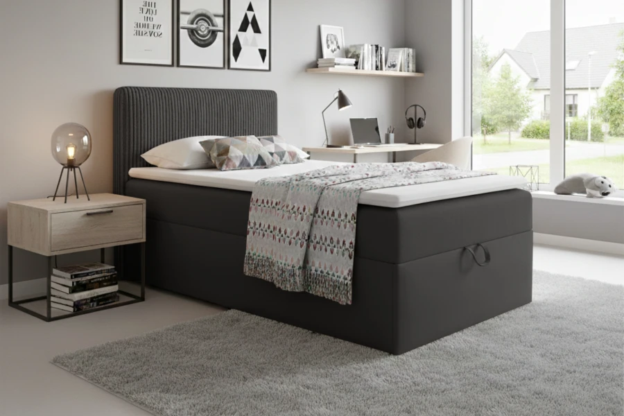 Stilvolles Jugendzimmer mit modernem anthrazitfarbenem Boxspringbett und Dekoration.