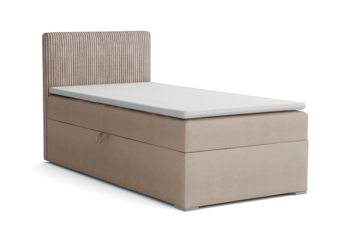 Beiges Boxspringbett mit geripptem Kopfteil und praktischem Bettkasten, freigestellt.