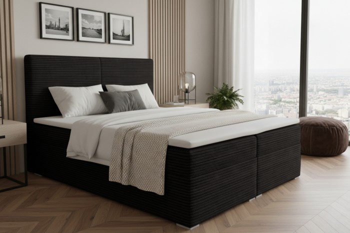 Schwarzes Boxspringbett in Cord-Optik im modernen Schlafzimmer mit Stadtblick.