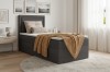 Anthrazitfarbenes Boxspringbett mit Bettkasten und gelber Wolldecke in modernem Design.