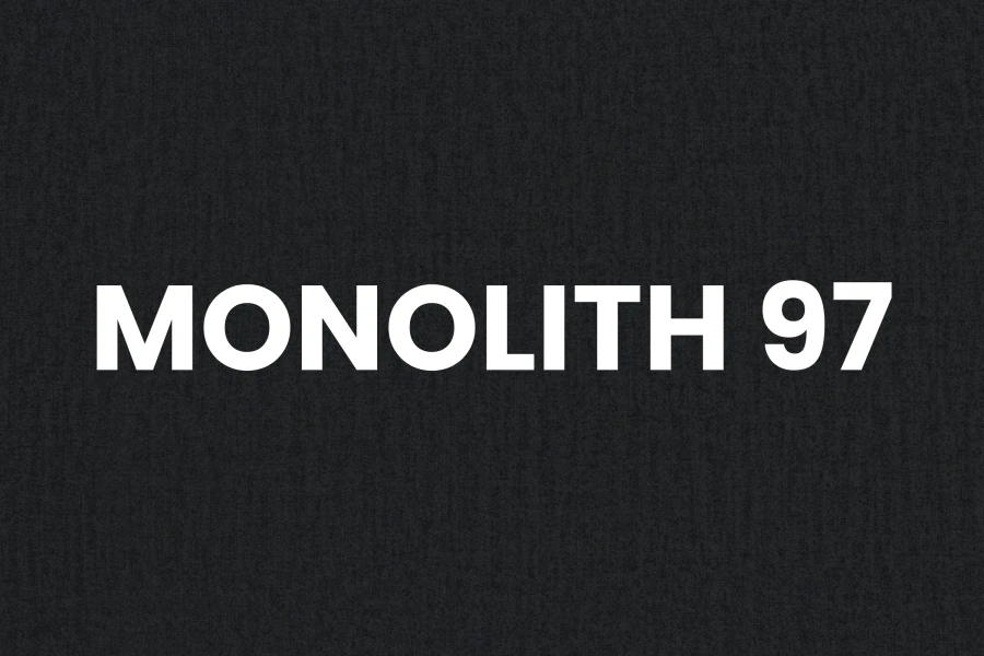Detailansicht der Stoffstruktur Monolith 97 in Dunkelgrau für hochwertige Polsterbezüge.