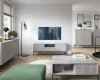 Modernes Wohnzimmer-Set mit passendem Sideboard, TV-Lowboard und Couchtisch in Hellgrau.