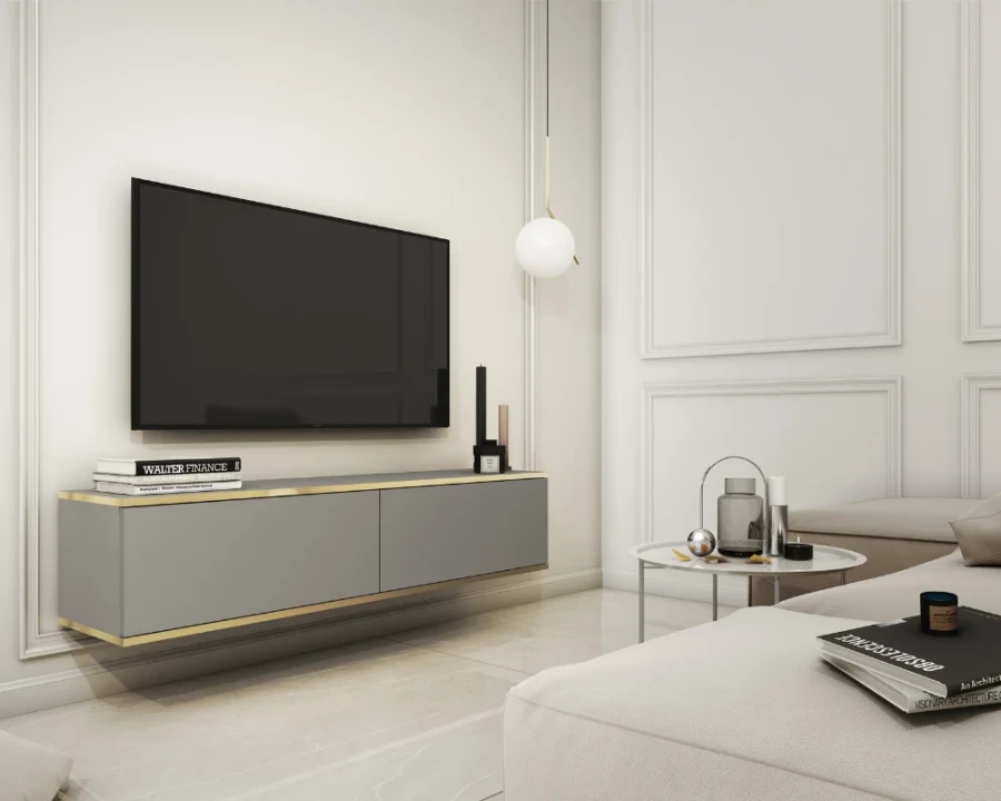 Graues hängendes TV-Board mit Golddetails unter modernem Fernseher