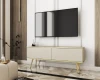 Elegantes beiges TV-Lowboard mit goldenen Füßen im stilvollen Wohnzimmer.