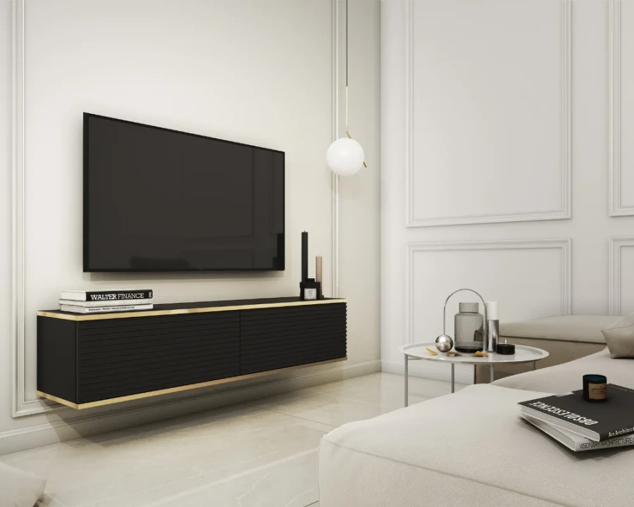 Schwarzes schwebendes TV-Lowboard mit Golddetails in stilvollem, hellem Wohnzimmer.