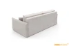 Rückansicht des beigen 3-Sitzer Sofas LILA in Bouclé-Optik.