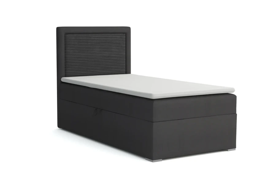 Anthrazitfarbenes Einzel-Boxspringbett mit Bettkasten und weißer Matratzenauflage.