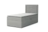 Modernes Boxspringbett in Grau mit strukturiertem Kopfteil, freigestellt für Produktansicht.