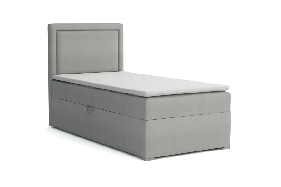 Graues Einzel-Boxspringbett ALA mit gepolstertem Kopfteil.