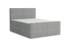 Hellgraues Boxspringbett in Cord-Optik auf weißem Hintergrund