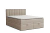 Beiges Boxspringbett mit vertikal gestepptem Kopfteil und Bettkasten.