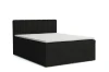 Modernes Boxspringbett in Schwarz mit integrierten Schubladen und gestepptem Kopfteil.