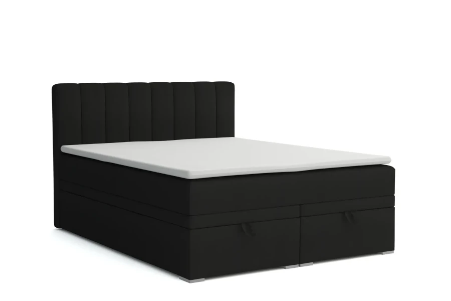 Modernes Boxspringbett in Schwarz mit integrierten Schubladen und gestepptem Kopfteil.