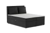 Modernes anthrazitfarbenes Boxspringbett mit zwei Kissen und Bettkasten.