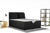 Modernes Boxspringbett aus Cord in einem stilvoll eingerichteten Zimmer