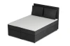 Schräge Seitenansicht eines Boxspringbetts mit grauem Cord-Stoff