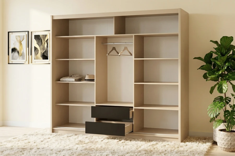 Beiger Kleiderschrank mit schwarzen Schubladen und Kleiderstange in einem hellen Zimmer.