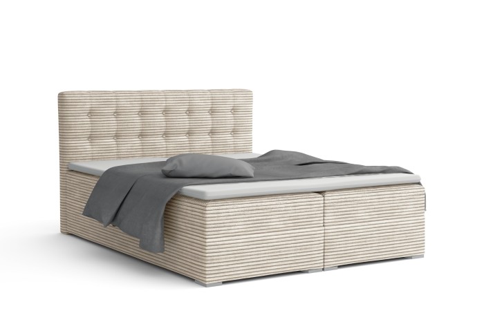 Beiges Boxspringbett mit Cord-Bezug und gestepptem Kopfteil, inkl. grauer Bettwäsche.