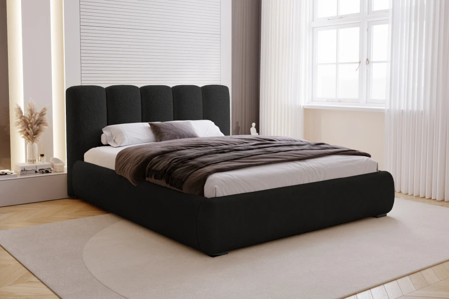 Modernes dunkelgraues Polsterbett mit hohem Kopfteil in hellem, stilvollem Schlafzimmer.
