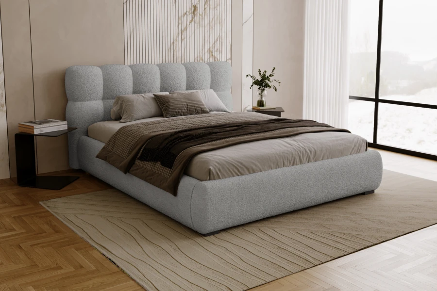 Modernes Polsterbett in Hellblau mit Bouclé-Stoff und gestepptem Kopfteil im Schlafzimmer.