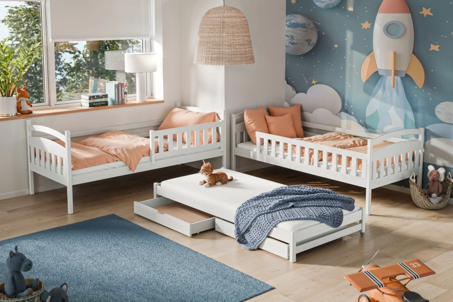 Modern children's room with white beds, space mural and pull-out extra bed.