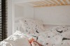 Cosy children's bed with ballet bedding and cloud lights