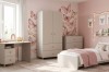 Cosy children's room with butterfly wall tattoos, bed and matching beige furniture from the Marco collection.