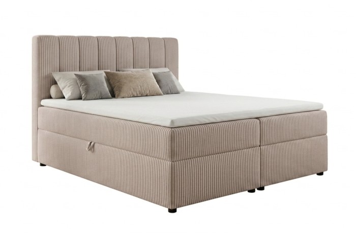 Beiges Boxspringbett Victor aus Cord-Stoff mit Bettkasten auf weißem Hintergrund.