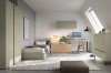 Furnishing idea for a youth room in sage green with work area under the eaves.