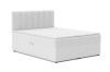 Modernes weißes Boxspringbett mit weichem Bouclé-Bezug auf weißem Hintergrund.