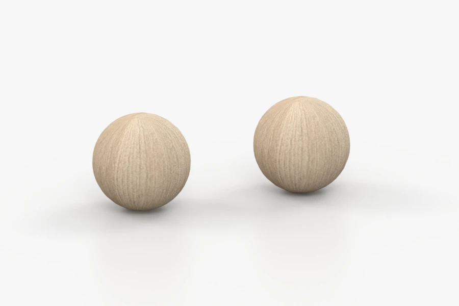 Zwei runde Möbelknöpfe aus hellem Holz als stilvolles Detail für Schranktüren und Schubladen.