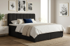 Schwarzes Boxspringbett mit Cord-Struktur in einem stilvollen Schlafzimmer.