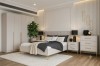 Modernes Schlafzimmer-Set in Beige mit Kleiderschrank, Doppelbett und Nachttisch.