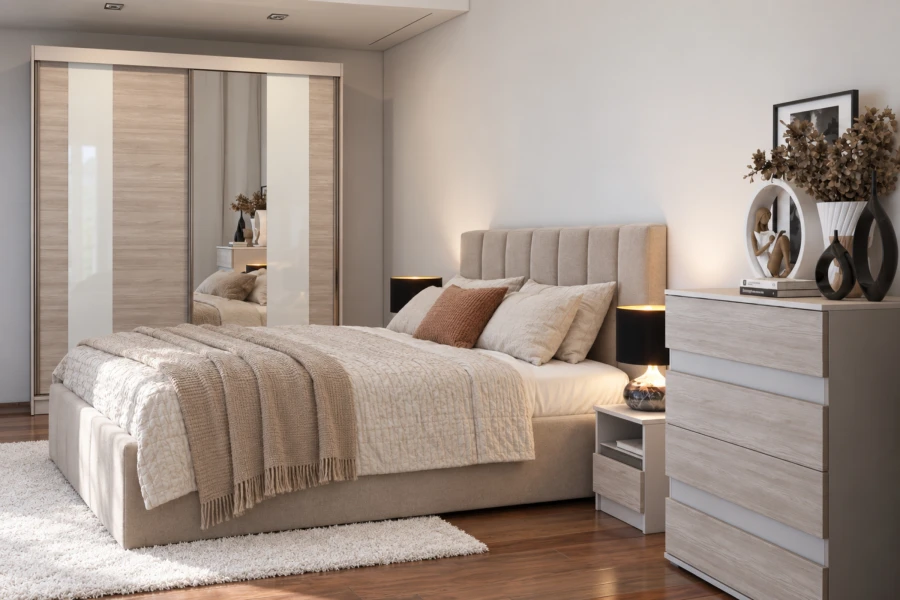Gemütliches Schlafzimmer mit Polsterbett, modernem Kleiderschrank und passender Kommode in hellem Holzdesign.