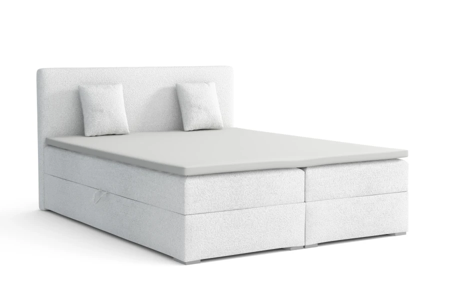 Modernes weißes Boxspringbett mit gepolstertem Kopfteil