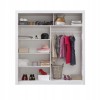 Interior layout of a wardrobe with shelves, clothes rail and baskets.